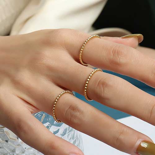 Anillo de Acero Tono Dorado - Flip image view